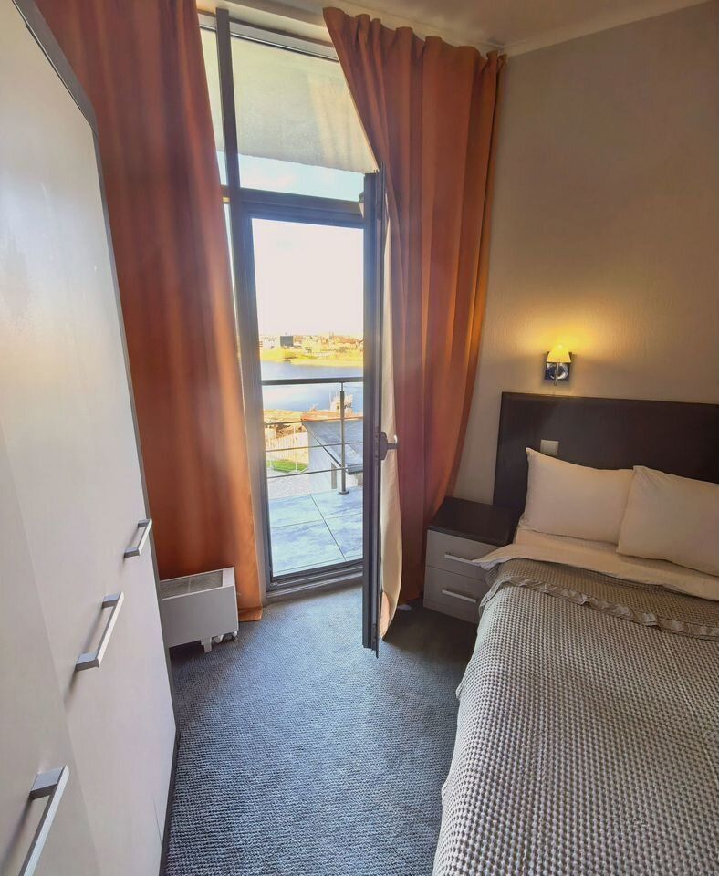 Апартаменты в здании бизнес комплекса "Зoлoтой Зaтoн"