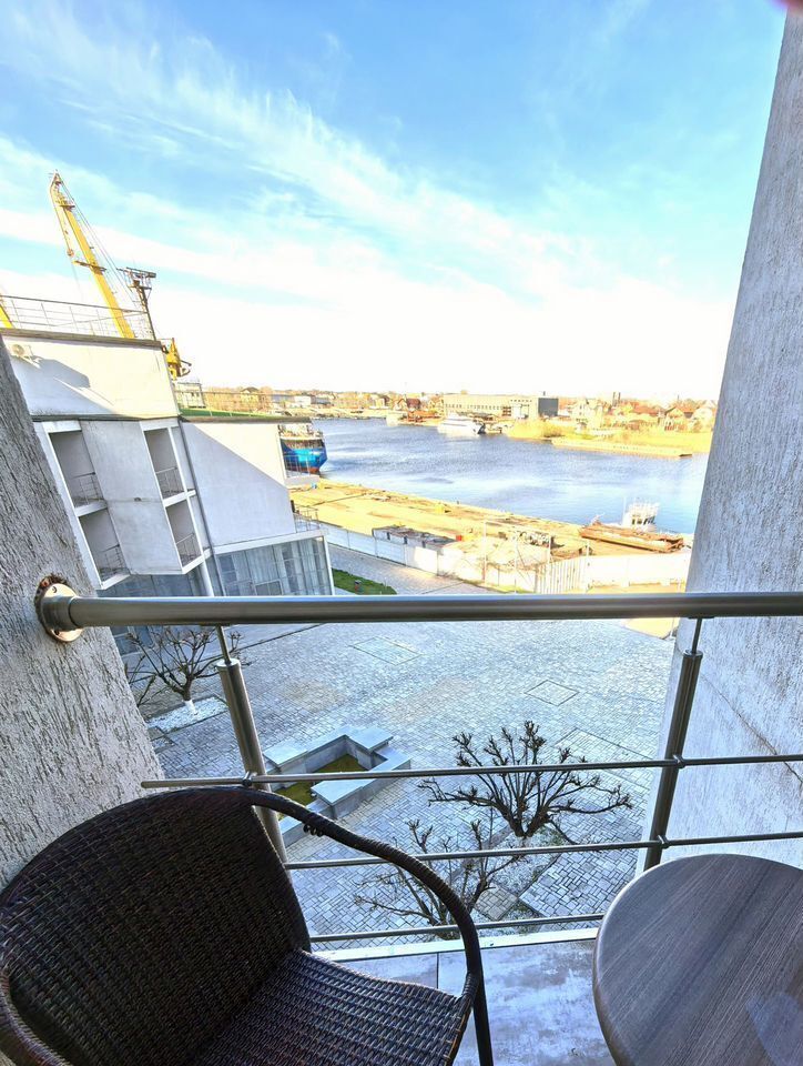 Апартаменты в здании бизнес комплекса "Зoлoтой Зaтoн"